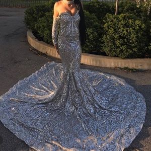 Silver prom dress with added rhinestones